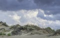 Menacing clouds over the pure white sandunes at Sampieri beach in Sicily in a summer windy day Royalty Free Stock Photo