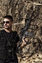 Menacing man with a machine gun Royalty Free Stock Photo