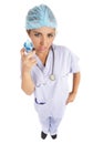 Menacing nurse holding needle Royalty Free Stock Photo