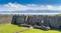 Menai Straits with low mist viewed from inside Beaumaris castle, anglesey north Wales Royalty Free Stock Photo