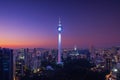 Menara Kuala Lumpur Tower at night. Aerial view of Kuala Lumpur Downtown, Malaysia. Financial district and business centers in