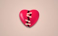 Mend a broken heart With plaster concept. Red 3D heart. depression and sadness concept