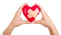 Mended heart in hands Royalty Free Stock Photo