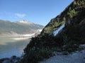 Mendenhall Glacier Juneau Alaska. Mendenhall Glacier flowing into Mendenhall Lake in between mountains with Nugget falls. Perfect Royalty Free Stock Photo