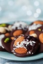 Mendiant traditional French chocolate candy for Christmas holiday. Homemade dessert with nuts and dried fruits. Xmas food. Royalty Free Stock Photo