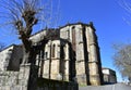 Mendicant Gothic Spanish Gothic landmark. Santo Domingo Church and Convent, apse and trees. Ribadavia, Spain. Royalty Free Stock Photo