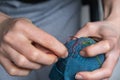 Mending clothes. Visible mending repairing sock