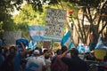 2020-10-12, Mendoza, Argentina: Man holding a sign against judicial reform during a protest.