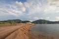 Mengkuang Dam with a yellow soil. Royalty Free Stock Photo