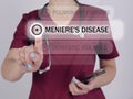 MENIERE`S DISEASE text in list. Doctor looking for something at smartphone