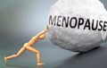 Menopause and painful human condition, pictured as a wooden human figure pushing heavy weight to show how hard it can be to deal