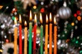 Menorah with burning candles for Hanukkah on sparkle background with defocused lights. Jewish holiday Royalty Free Stock Photo