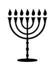 Menorah with candles. Jewish symbol. Black vector icon.