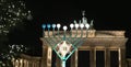 Menorah and Christmas Tree in Pariser Platz, Berlin, Germany Royalty Free Stock Photo