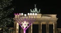 Menorah and Christmas Tree in Pariser Platz, Berlin, Germany Royalty Free Stock Photo