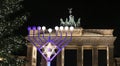 Menorah and Christmas Tree in Pariser Platz, Berlin, Germany Royalty Free Stock Photo