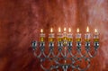 Menorah Hanukkah candles are burning in hanukkiah on light seven holiday day