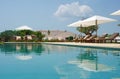 Menorca, Balearic Islands, Spain, pool, deckchair, relax, sunbathing, olive, tree, countryside, green Royalty Free Stock Photo