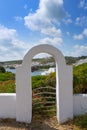 Menorca Cala Sa Mesquida Mao Maon arch entrance