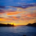 Menorca sunset in Cala Morell at Ses torretes beach