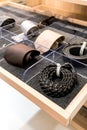 Mens accessories in closet drawer