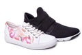 Mens black and womens white sport shoes