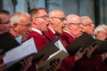 Mens choir performing in a cathedral Royalty Free Stock Photo