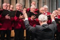 Mens choir performing in a cathedral