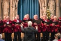 Mens choir performing in a cathedral