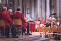 Mens choir performing in a cathedral