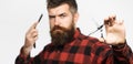 Mens haircut. Barber scissors. Long beard. Bearded man, lush beard, handsome. Vintage barbershop, shaving. Sexy men