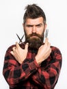 Mens haircut, shaving. Male in barbershop. Bearded man, long beard, brutal, caucasian hipster with moustache. Mens Royalty Free Stock Photo