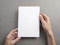 Mens hands holding white letterhead Royalty Free Stock Photo