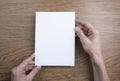 Mens hands holding empty white letterhead Royalty Free Stock Photo