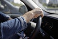 Mens hands on the streering wheel of the car Royalty Free Stock Photo
