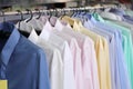 Mens plaid shirts on hangers in a retail store Royalty Free Stock Photo