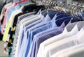 Mens plaid shirts on hangers in a retail store Royalty Free Stock Photo