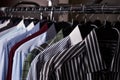 Mens shirts in different colors on hangers Royalty Free Stock Photo