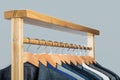 Mens shirts, suit hanging on rack. Hangers with jackets on them in boutique. Suits for men hanging on the rack. Mens Royalty Free Stock Photo