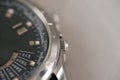 Mens steel wrist watch with calendar closeup. Copy space. Royalty Free Stock Photo