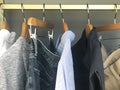 Mens stylish clothing on hangers Royalty Free Stock Photo