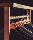 Mens suits in different colors hanging on hanger in a retail clothes store, close-up. Mens shirts, suit hanging on rack Royalty Free Stock Photo
