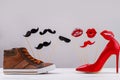 Mens and womens shoes on white background. Royalty Free Stock Photo