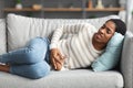 Menstrual Pain. Young Black Female Suffering From Acute Abdominal Ache At Home Royalty Free Stock Photo