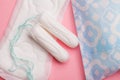 Menstruation concept, sanitary pads and tampons on pin