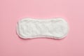 Menstruation, sanitary pad on pink