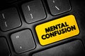 Mental Confusion is the inability to think as clearly or quickly as you normally do, text button on keyboard, concept background