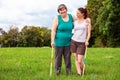 Mental disabled woman is playing crocket to train her motor abilities Royalty Free Stock Photo