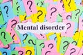 Mental Disorder Syndrome text on colorful sticky notes Against the background of question marks