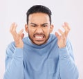 Mental health, anger and mad with a frustrated man in studio on a gray background feeling stress. Face, psychology and Royalty Free Stock Photo